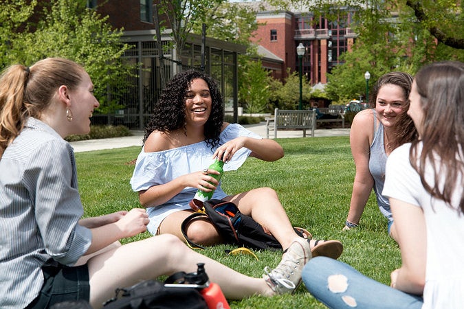 Students meeting on EMU green