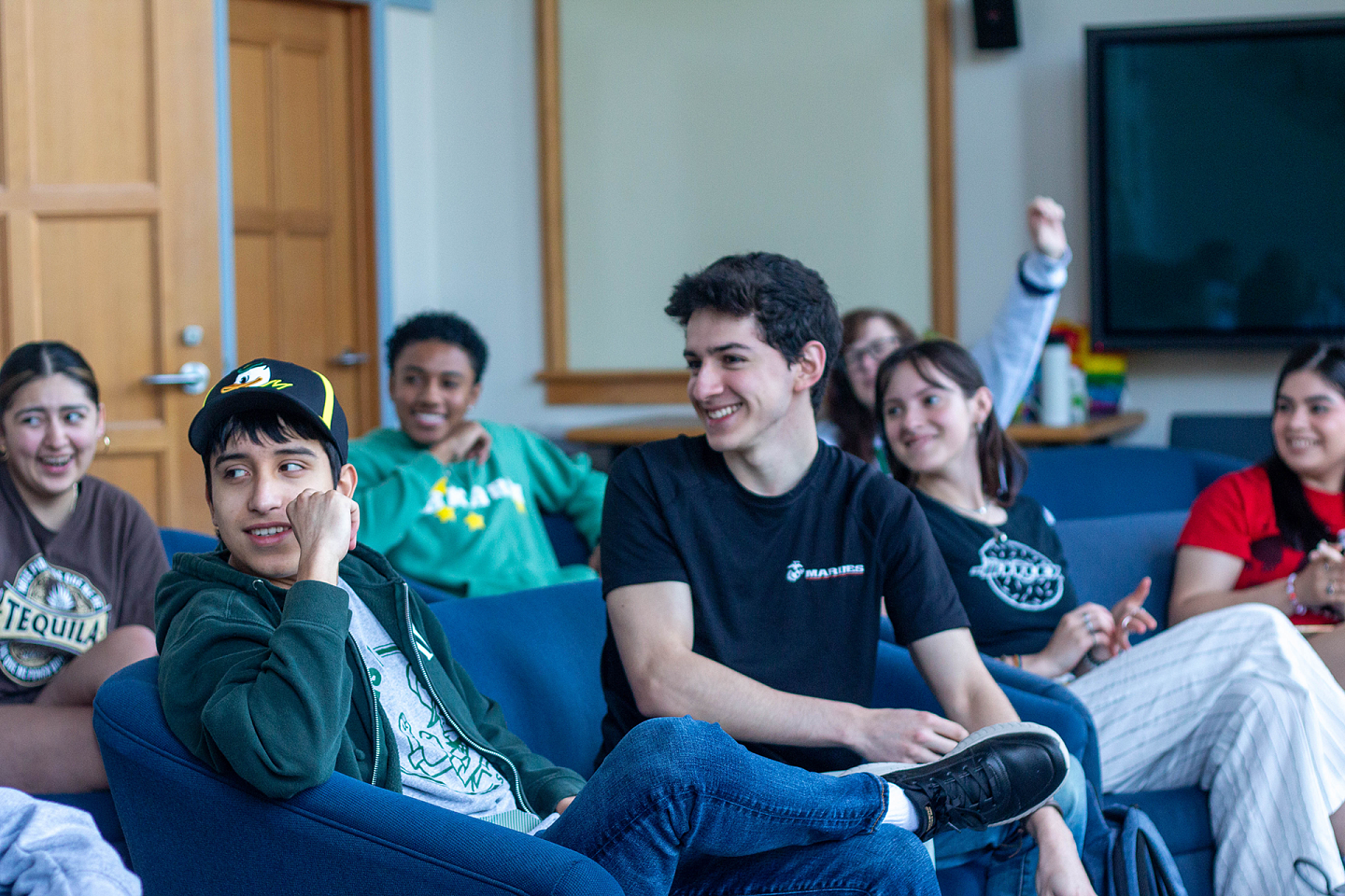 group of students interacting with one another