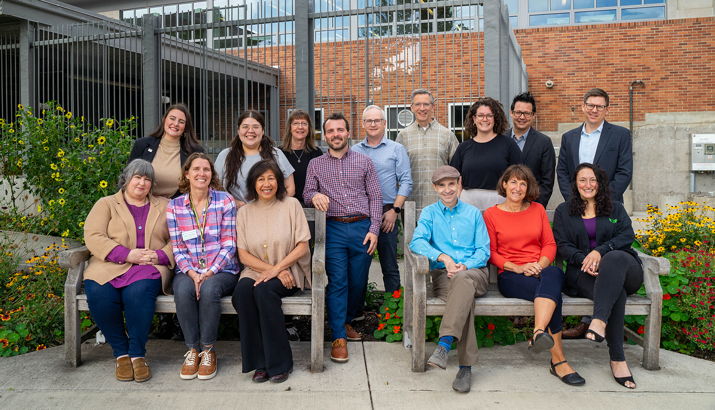 UESS leadership team posing together outside of the Erb Memorial Union