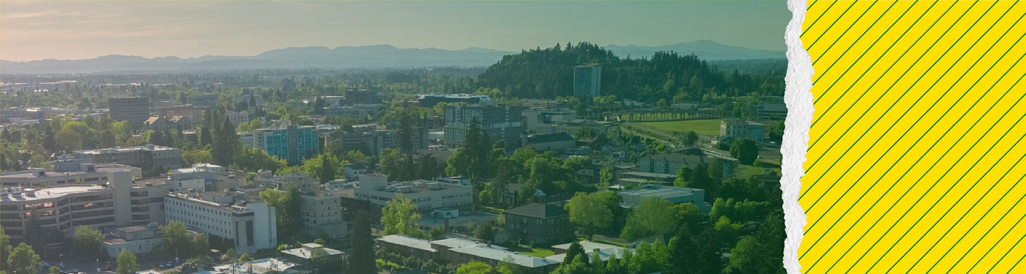 spring campus aerial of UO with yellow strip with green diagonal lines