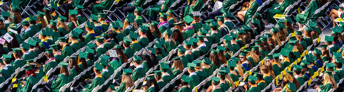 An overhead view of students at commencement